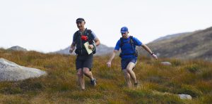 Two runners out on hill