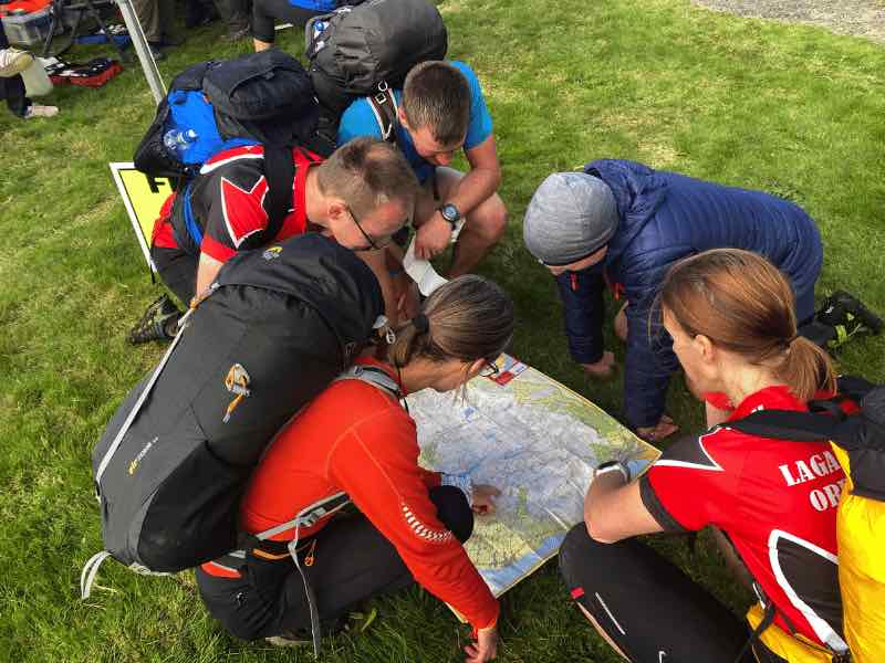Mourne Mountain Marathon Results 2022 group of people looking at a map