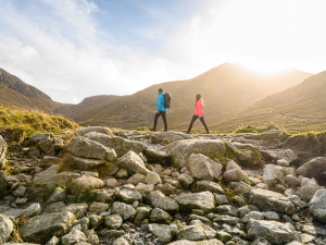 Two people walking in the Mourne Mountains